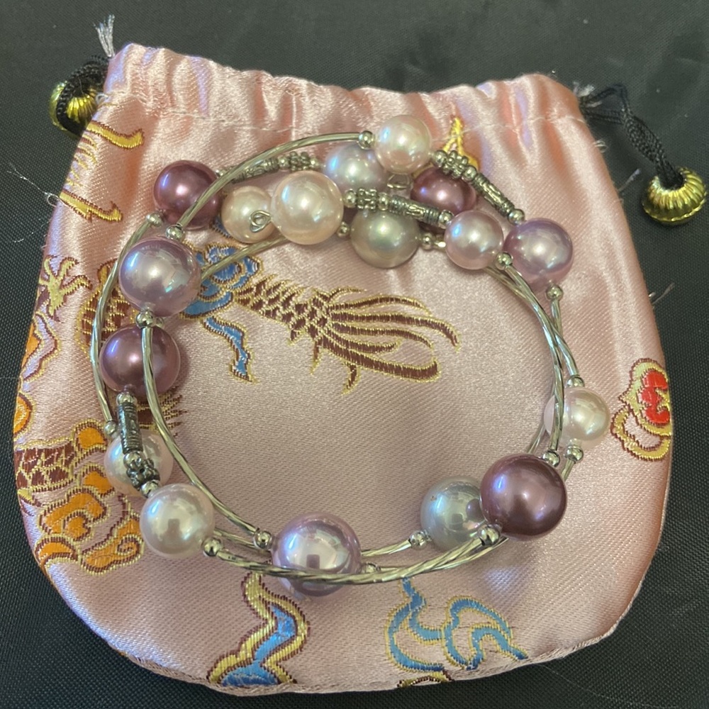Bracelet- wrap a round;  pink / purple in color